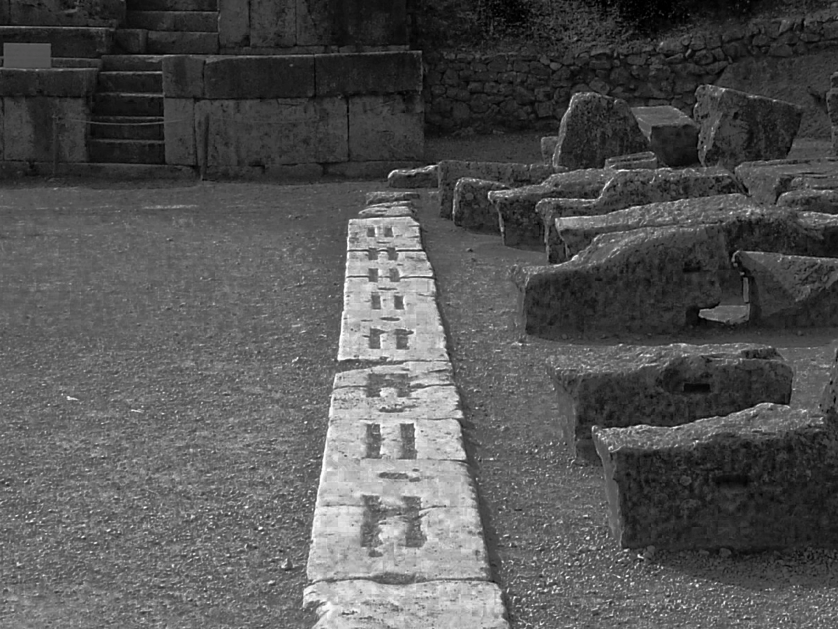 The ancient stone starting line at the Delphi stadium in Greece